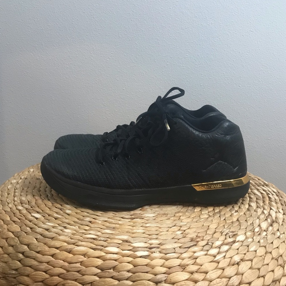 Jordan 31 low black and gold